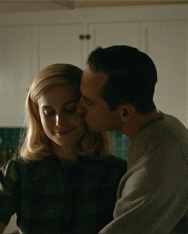 Elizabeth and Calvin are looking at each other in a lab in Lessons in Chemistry.