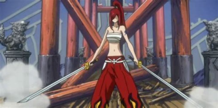 Erza in her battle suit lift a sword above her head