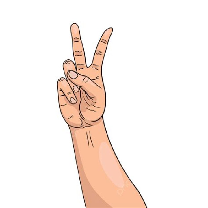 Junko holding up two fingers to her head and in black outfit