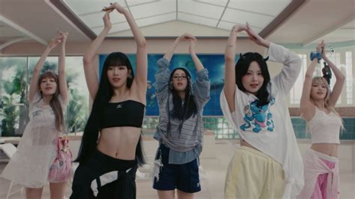 LE SSERAFIM members dancing in the music video for their single "Unforgiven"