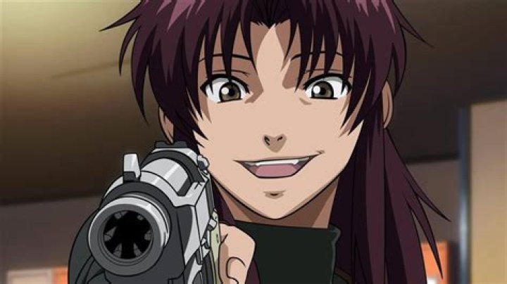 Revy smiling and with her tattoo showing