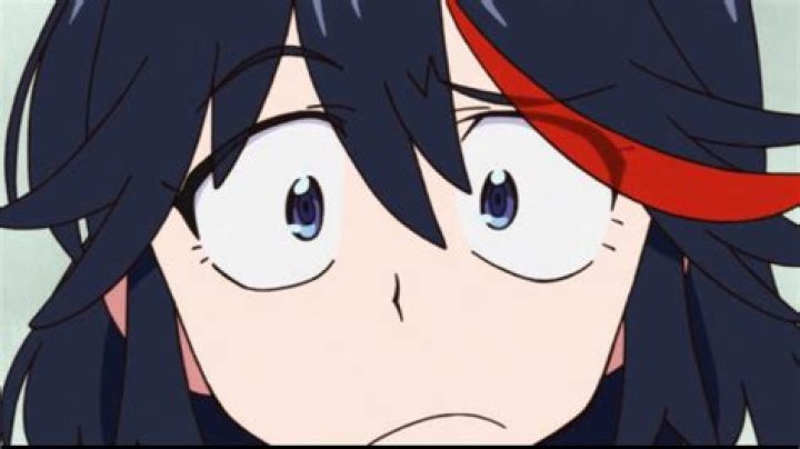 Ryuko looking confused in her black battle armor