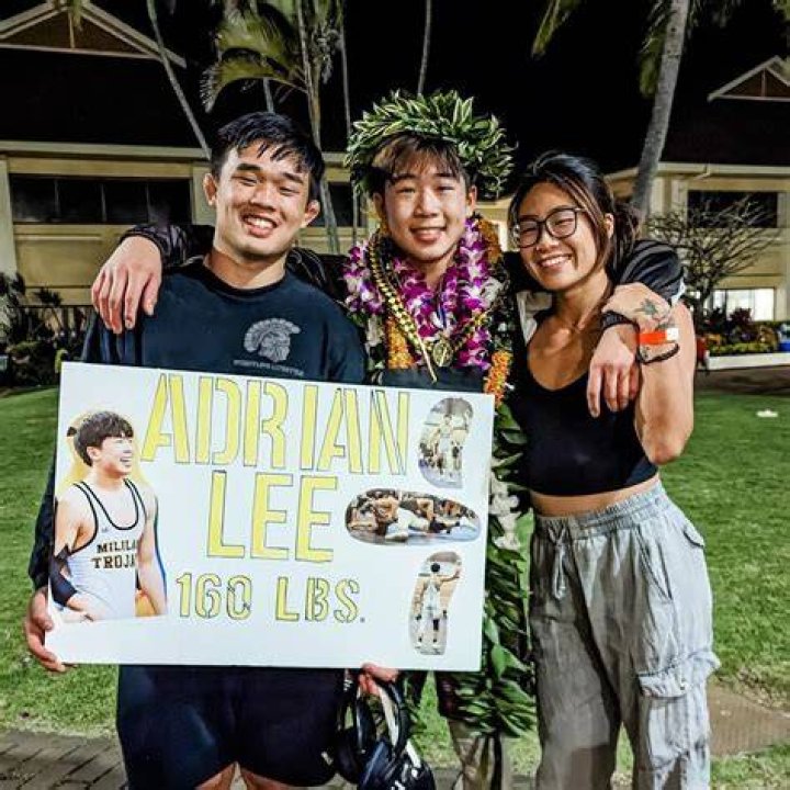 Who are Angela Lee brothers Christian Lee and Adrian Lee?